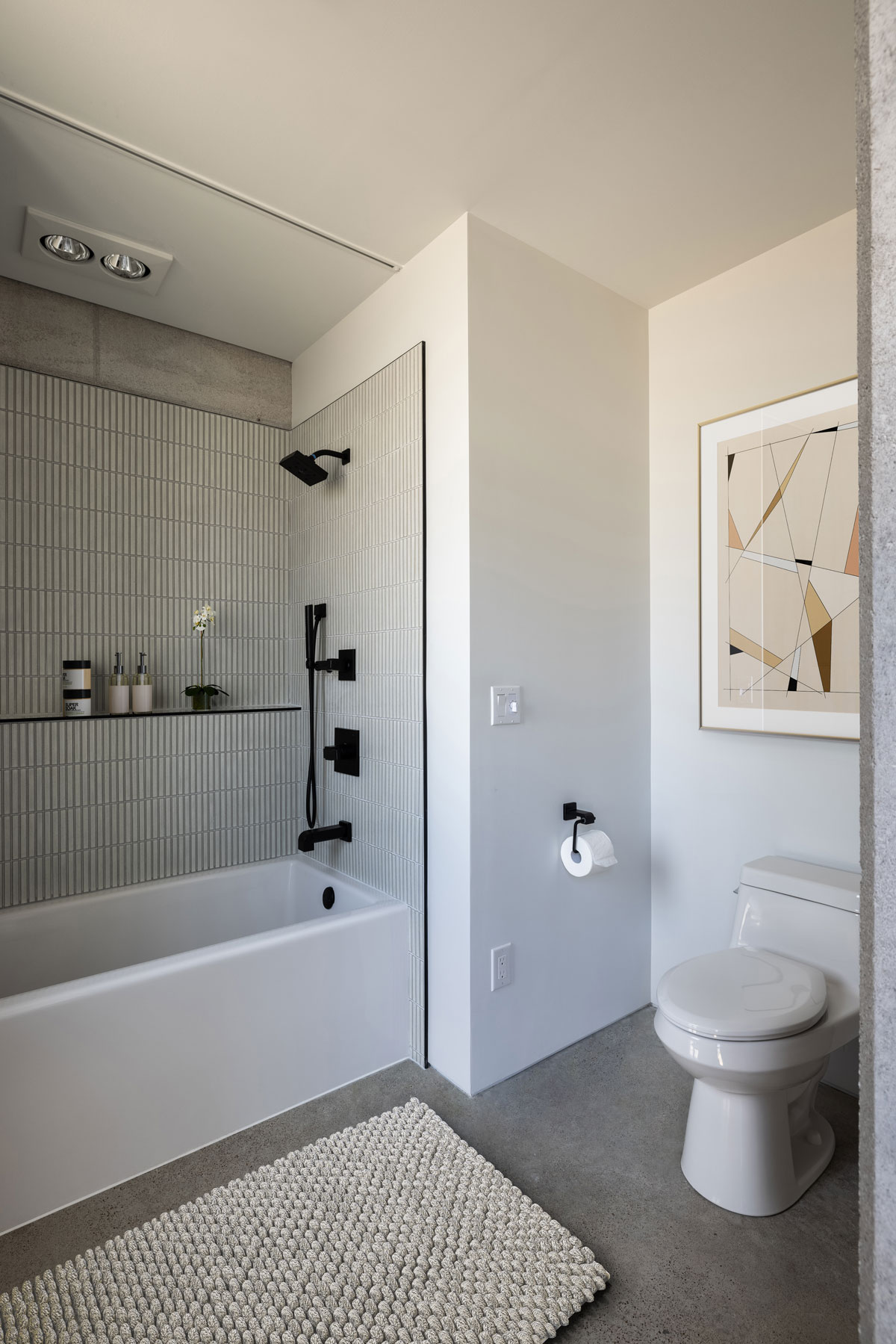 A clean and simple contemporary bathroom in a NW Arkansas custom modern home.