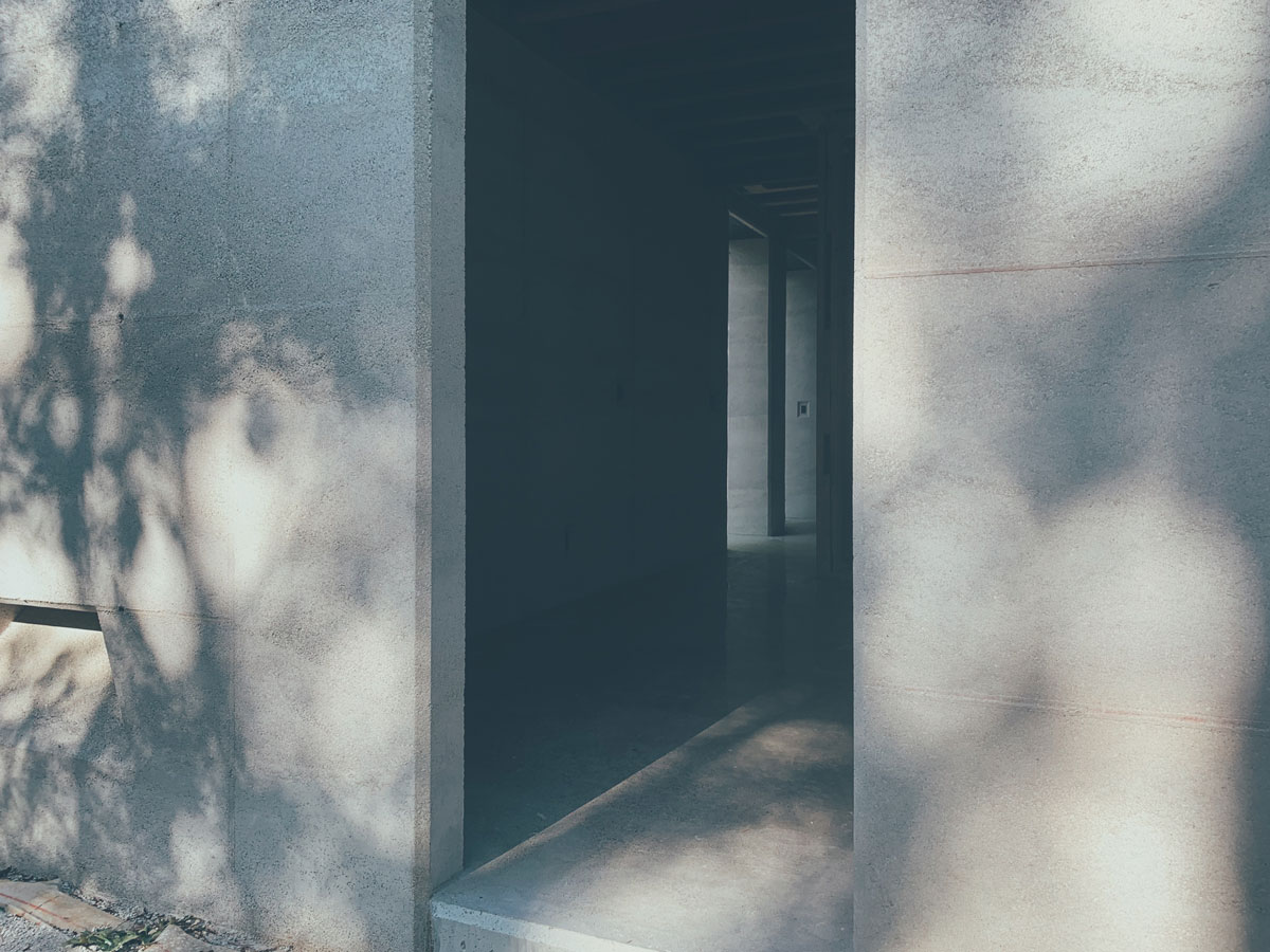 One of the beautiful things about rammed earth is the sense of time and place it brings to a build. The walls feel ancient and anchored. 