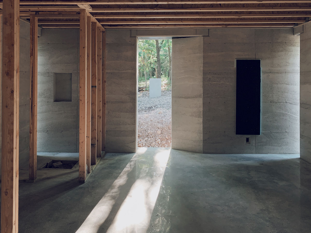 The textures of the wall, the floor reflecting light like water, it's almost too perfect