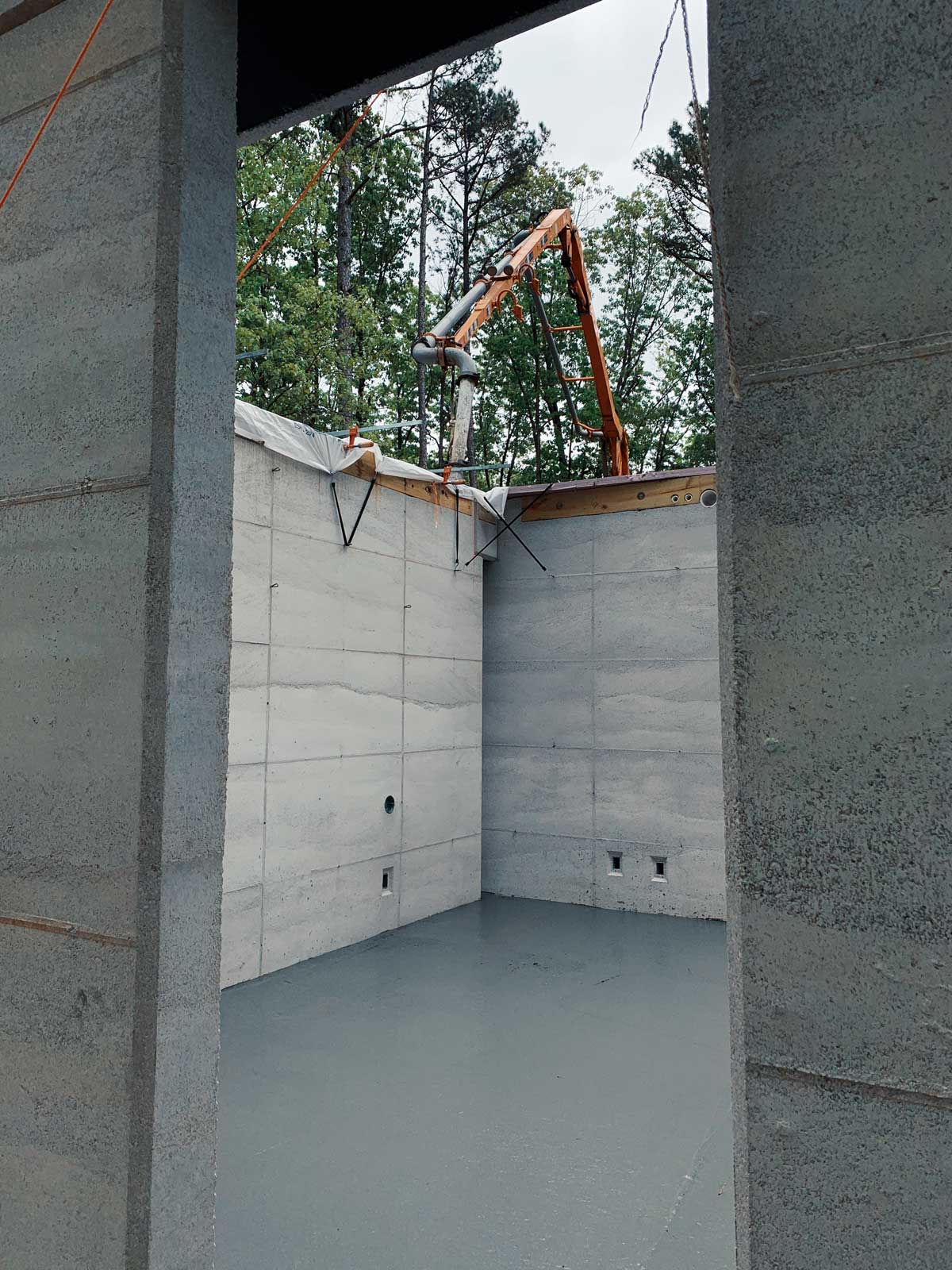 A freshly poured concrete floor in a rammed earth modern home in NW Arkansas