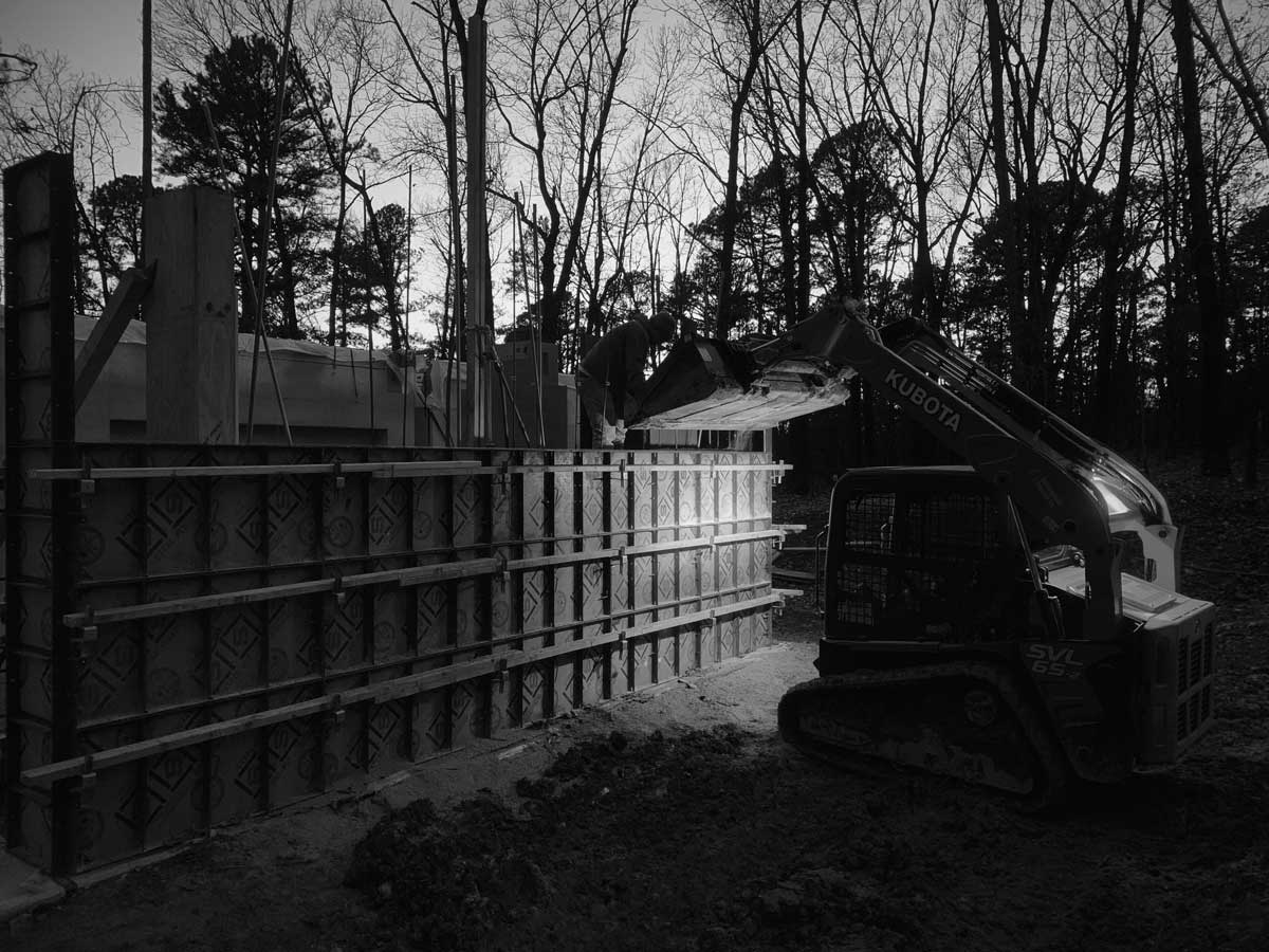 The construction process on a rammed earth wall in NW Arkansas