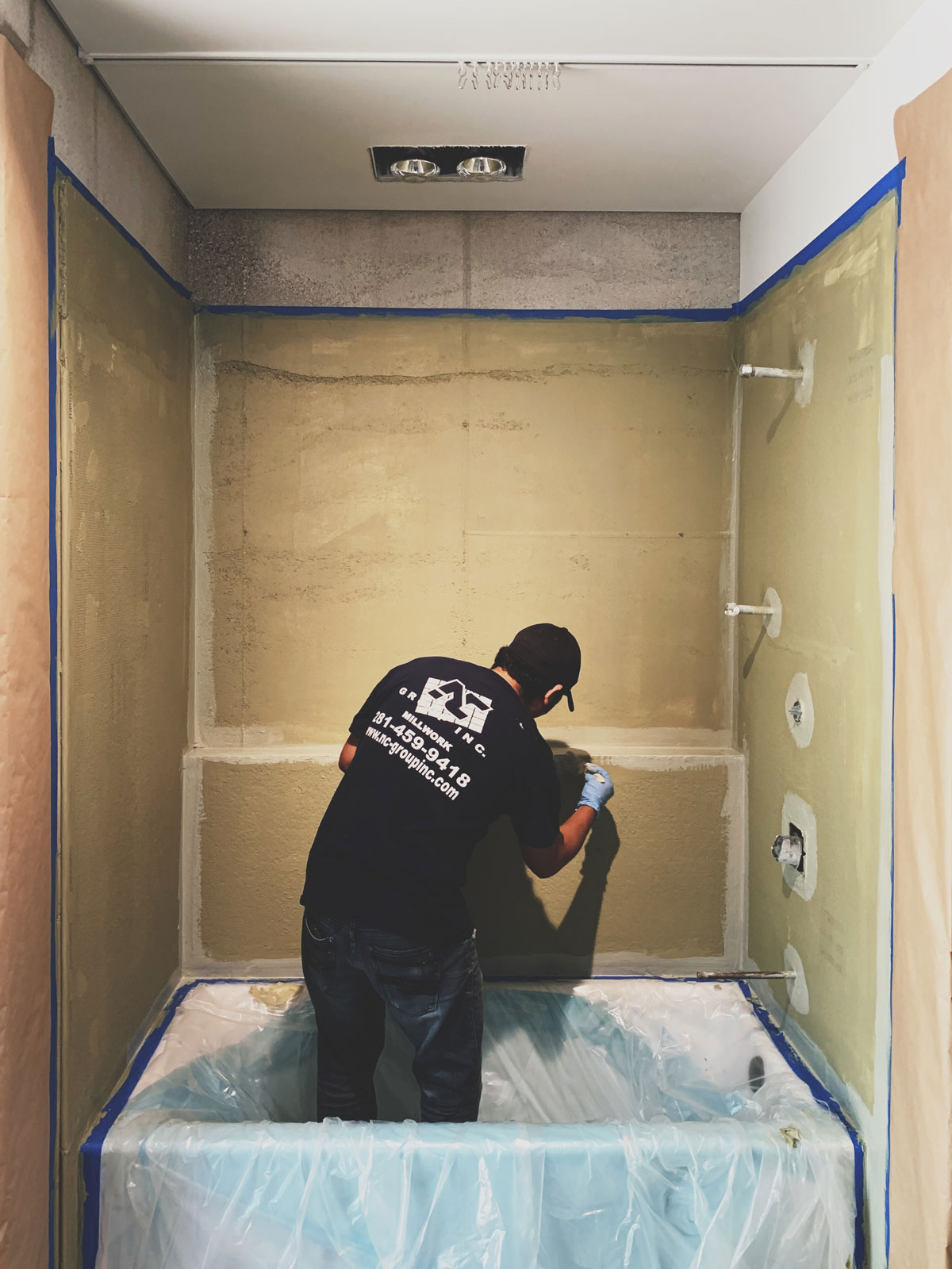 Waterproofing the tub and shower surround in preparation for tile